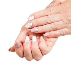 Female hands with manicure on a white background