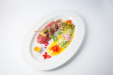 Tartarus from young calf with capers, gherkins, onion and quail eggs