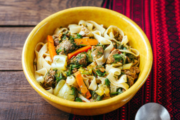 Lagman, Central Asian national dish with lamb, long noodles and vegetables