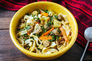 Lagman, Central Asian national dish with lamb, long noodles and vegetables