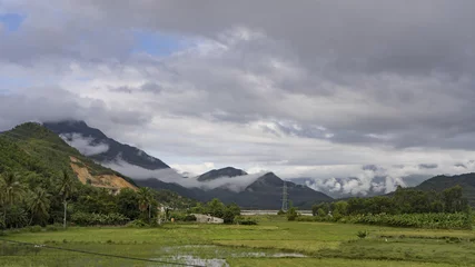 Foto op Canvas Autumn in Vietnam, mountains and clouds. Time lapse. © Hryhorii