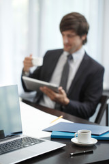 Fototapeta premium Business man with tablet computer