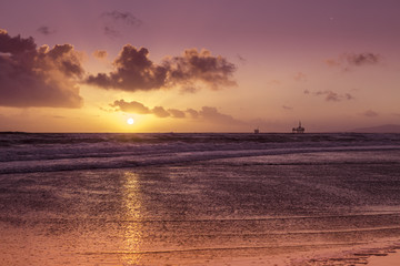 Oil Rig in Sun Set