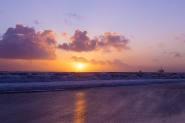 Oil Rig in Sun Set