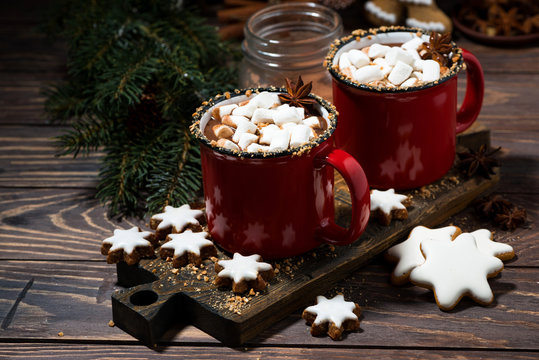 cozy winter drink hot chocolate on a wooden background, top view