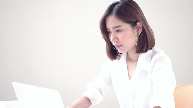 4k Unhappy girl get serious during working on computer