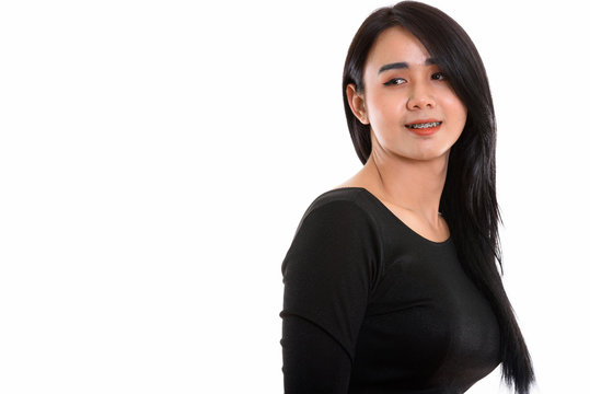 Studio Shot Of Young Happy Asian Transgender Woman Smiling While