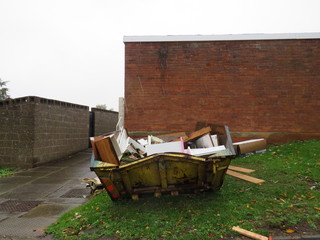 metal skip full of hose clearance rubbish