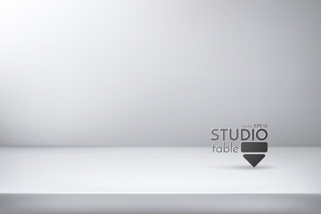 Realistic vector illustration. Studio table for design. White surface with background