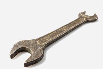 Tool: old wrench on white background, isolate.