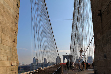 New York, USA - November 22, 2010: Spectacular views of the Brooklyn Bridge with all its characteristic metal wires and the pedestrian walkway
