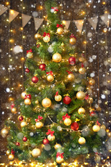 Obraz na płótnie Canvas christmas tree with new year decoration and lights on wooden background, holiday concept backdrop