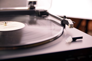 Fototapeta na wymiar Turntable vinyl record player is playing music