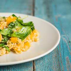 Vegan plate with bulgur and pumpkin.