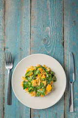 Vegan plate with bulgur and pumpkin.