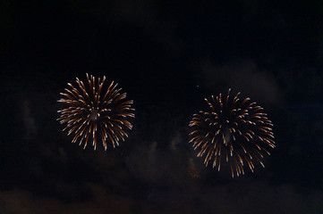 golden fireworks in black background