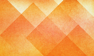 orange abstract background with autumn colors of red and yellow textured design for thanksgiving halloween and fall, geometric block pattern