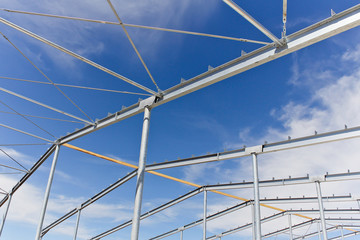 Close-up of metal construction at the construction site. Metal. Roof.