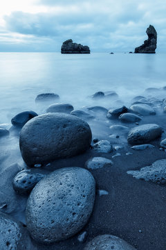 Eidisdrangar sea stacks in the north coast of Heimaey, Westman Islands, Iceland