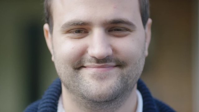 Portrait of caucasian man smiling to camera