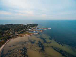 Top aerial view of the harbour for small vessels, both private and fishing boats in the Baltic Sea, Estonian coast