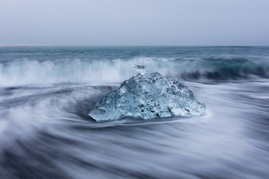 Melting Ice on the black volcanic sand beach in Iceland