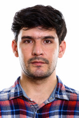 Obraz premium Studio shot of face of young Persian man