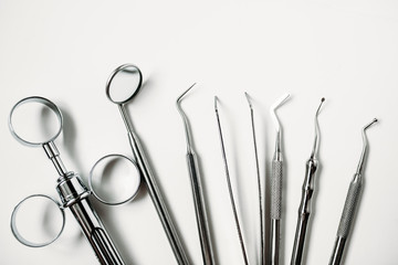 dental and endodontic restoration instruments on a white background. Top view
