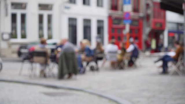 Out of focus background plate of cafe patio street scene for compositing