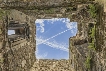 Looking upwards through a roofless castle turret  © lizziemaher