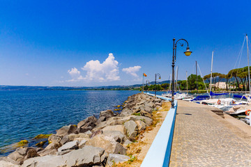 Boats in harbor by Lake Bolsena, Italy