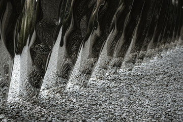 Beautiful grey texture reflecting pebbles on a road. Minimalistic modern art