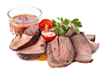 Roasted sliced meat isolated on a white background.