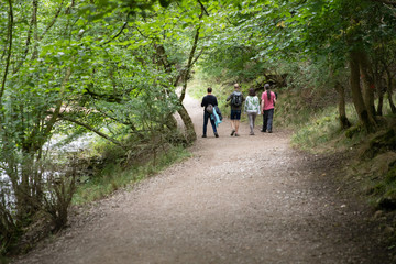 Friends exploring the beautiful countryside at Dovedale, Thorpe, Derbyshire, UK August 2018