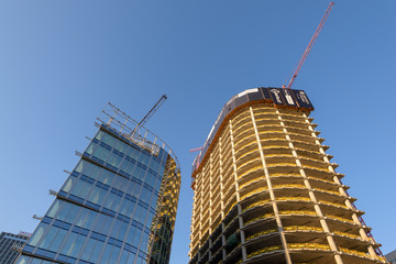Apartment skyscrapers under construction in Warsaw, Poland