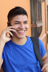 Young lad calling by phone 