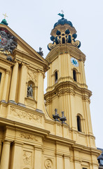 Fototapeta na wymiar Fragment of The Theatine Church of St. Cajetan (Theatinerkirche St. Kajetan), a Catholic church in Munich, founded by Elector Ferdinand Maria and his wife, Henriette Adelaide of Savoy