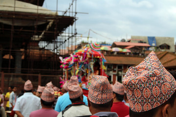 The "Dhaka Topi" worn by local Nepali people who are having a festival around Patan Durbar Square