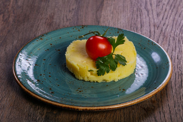 Mashed potato served tomato