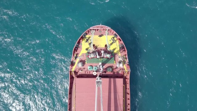 Large Bulk carrier vessel at the Mediterranean sea - Top down aerial footage