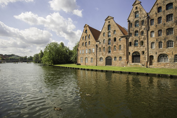 Obraz premium Facade of old buildings near the river, in Lubeck, Germany