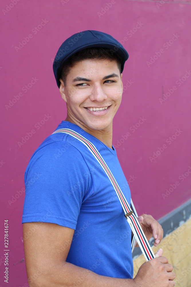 Wall mural young gentleman wearing a cool outfit