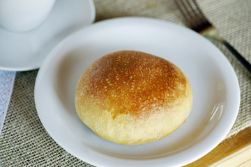Potato bread on the table set for breakfast