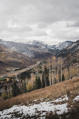 Landscape view of East Vail with the Gore Range in the background after an autumn snow storm. 