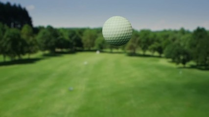 Aerial view of the golf ball. Shot in super slow motion.