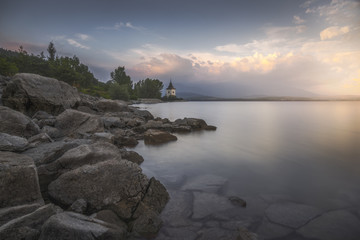 Rocky Beach of Liptovska Mara Lake in Slovakia at Sunset