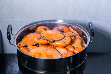 Steamed crab in pot.  live crabs in a pot. steaming shanghai hairy crabs, chinese cuisine. Steamed crab, Chinese seafood stalls.