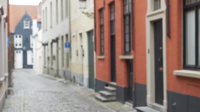 Panning background plate of narrow cobblestone street in Europe for compositing