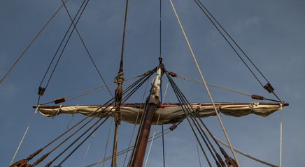 Sails and ropes of an old wooden boat