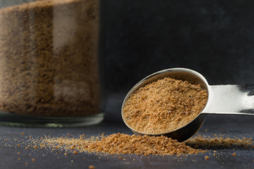 Coconut Sugar Spilled from a Teaspoon